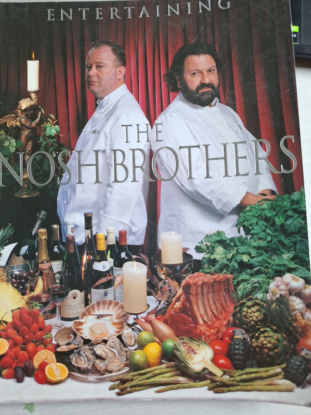 Used cookbooks for sale featuring The Nosh Brothers with a table of fresh ingredients and gourmet dishes