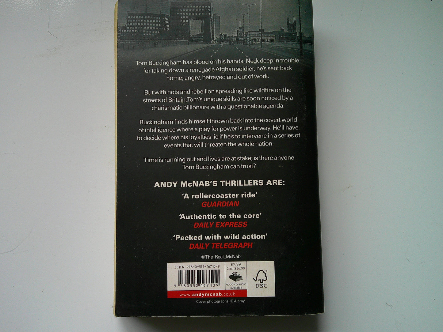 Back cover of Andy McNab The Fortress book showcasing a gripping thriller description