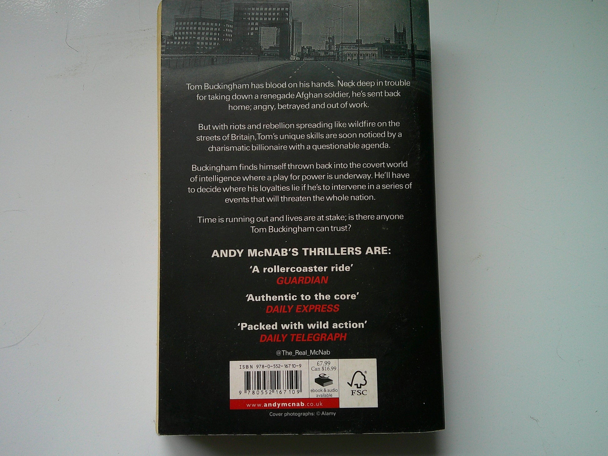 Back cover of Andy McNab The Fortress book showcasing a gripping thriller description