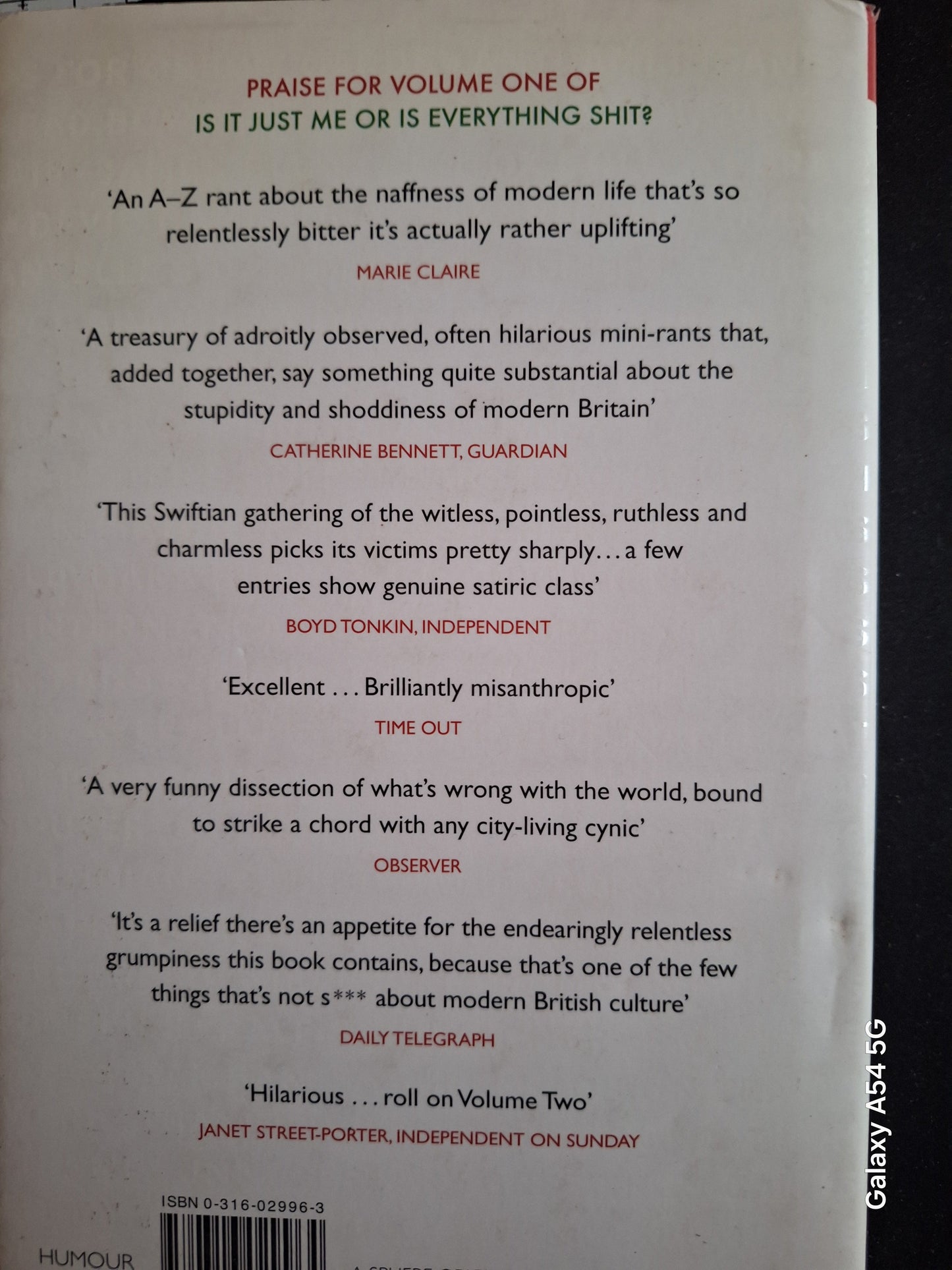 Book page showing reviews for volume one of Is it just me with quotes from Marie Claire, Guardian, Independent, and others