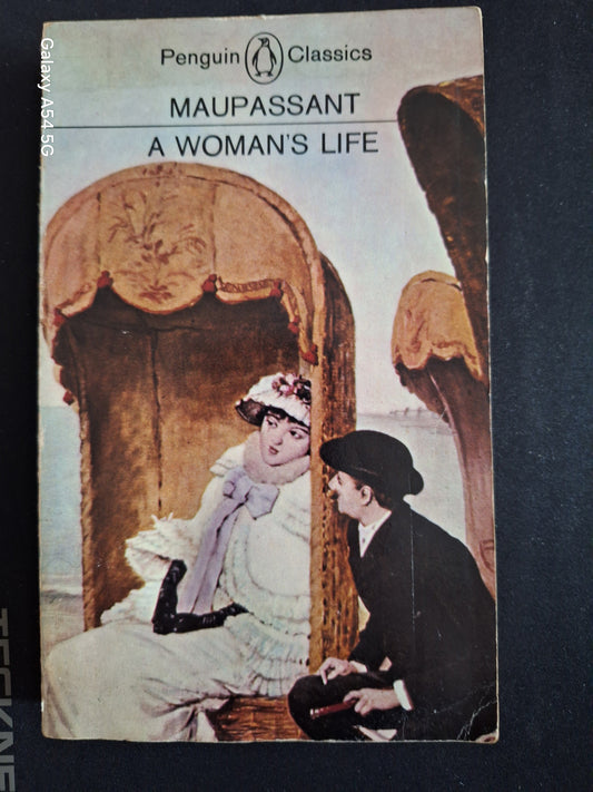 Penguin Classics Maupassant book A Woman's Life cover featuring vintage illustration of a woman and a man sitting