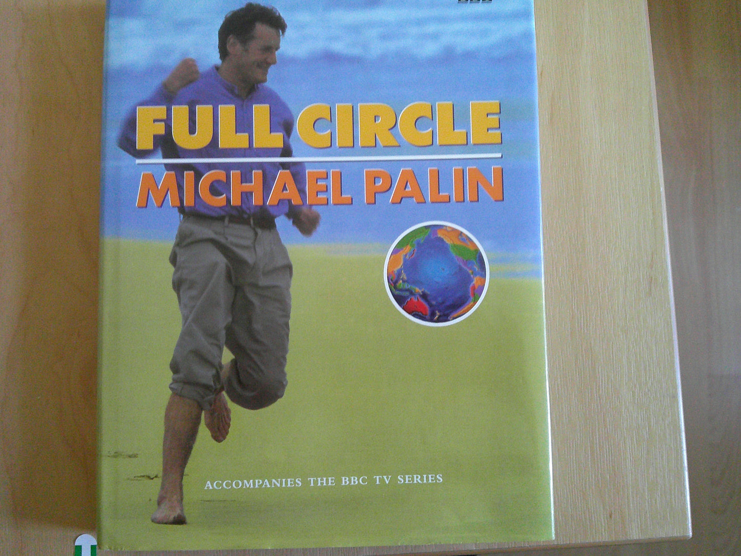 Michael Palin travel documentaries book titled Full Circle, featuring the author on the cover in a scenic setting