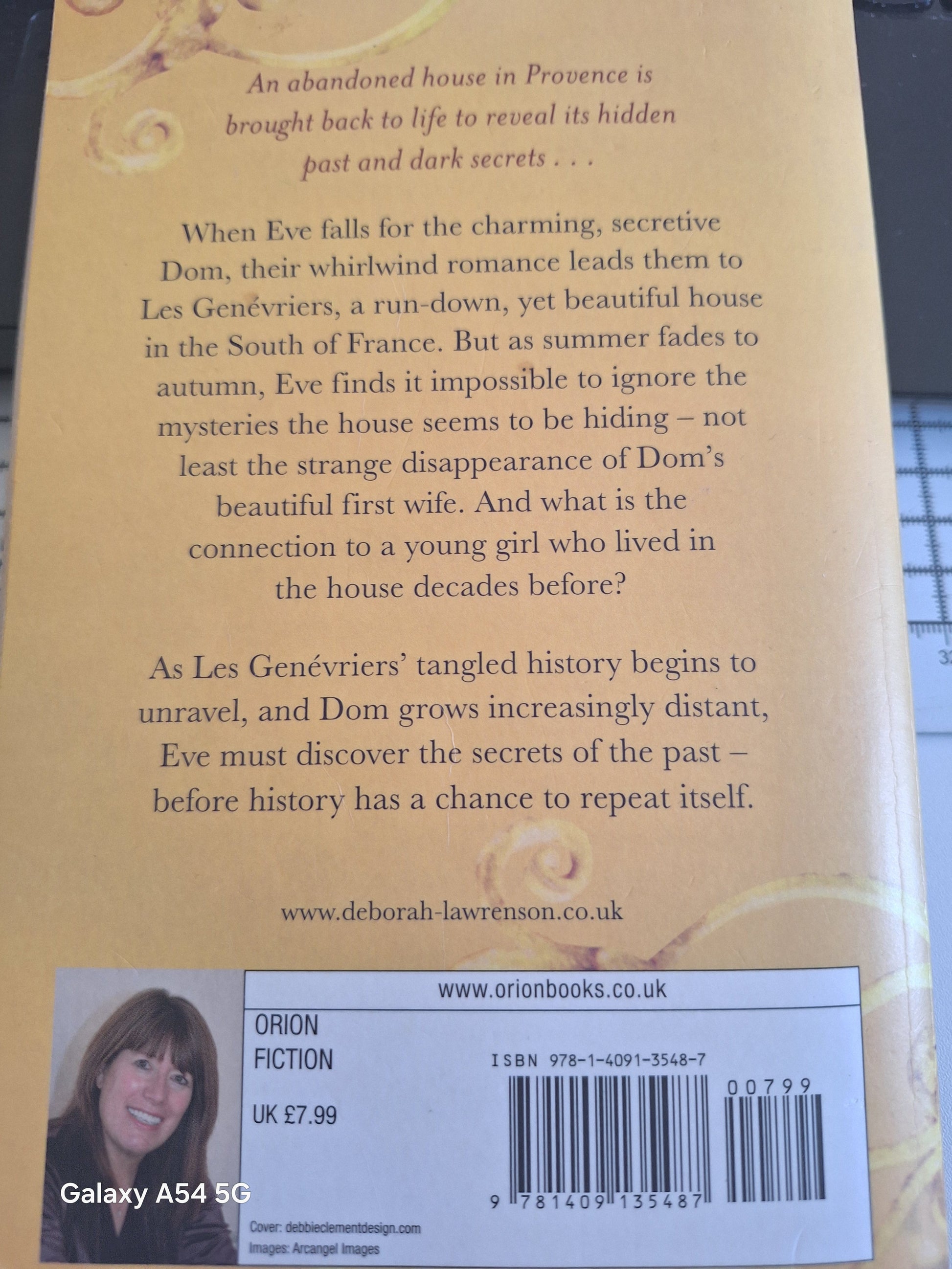 The Lantern Deborah Lawrenson used book showcasing its intriguing back cover and description