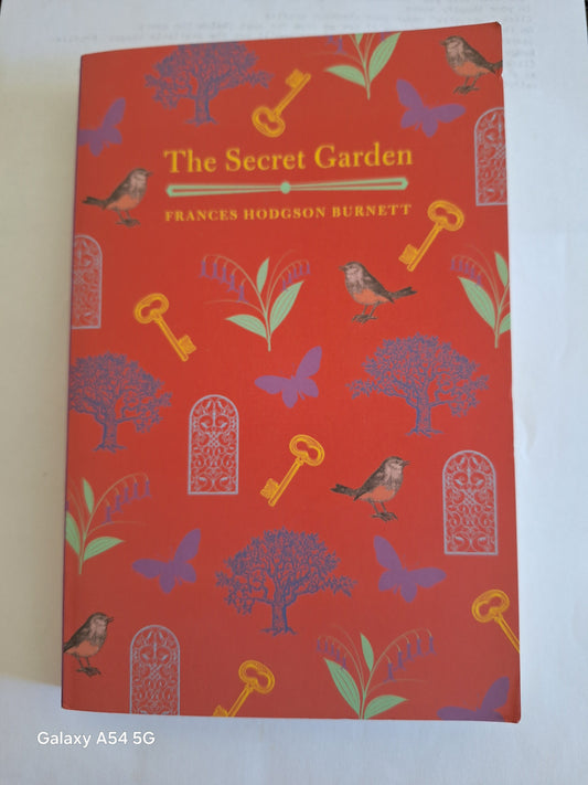 The Secret Garden used book by Frances Hodgson Burnett with a vibrant patterned cover