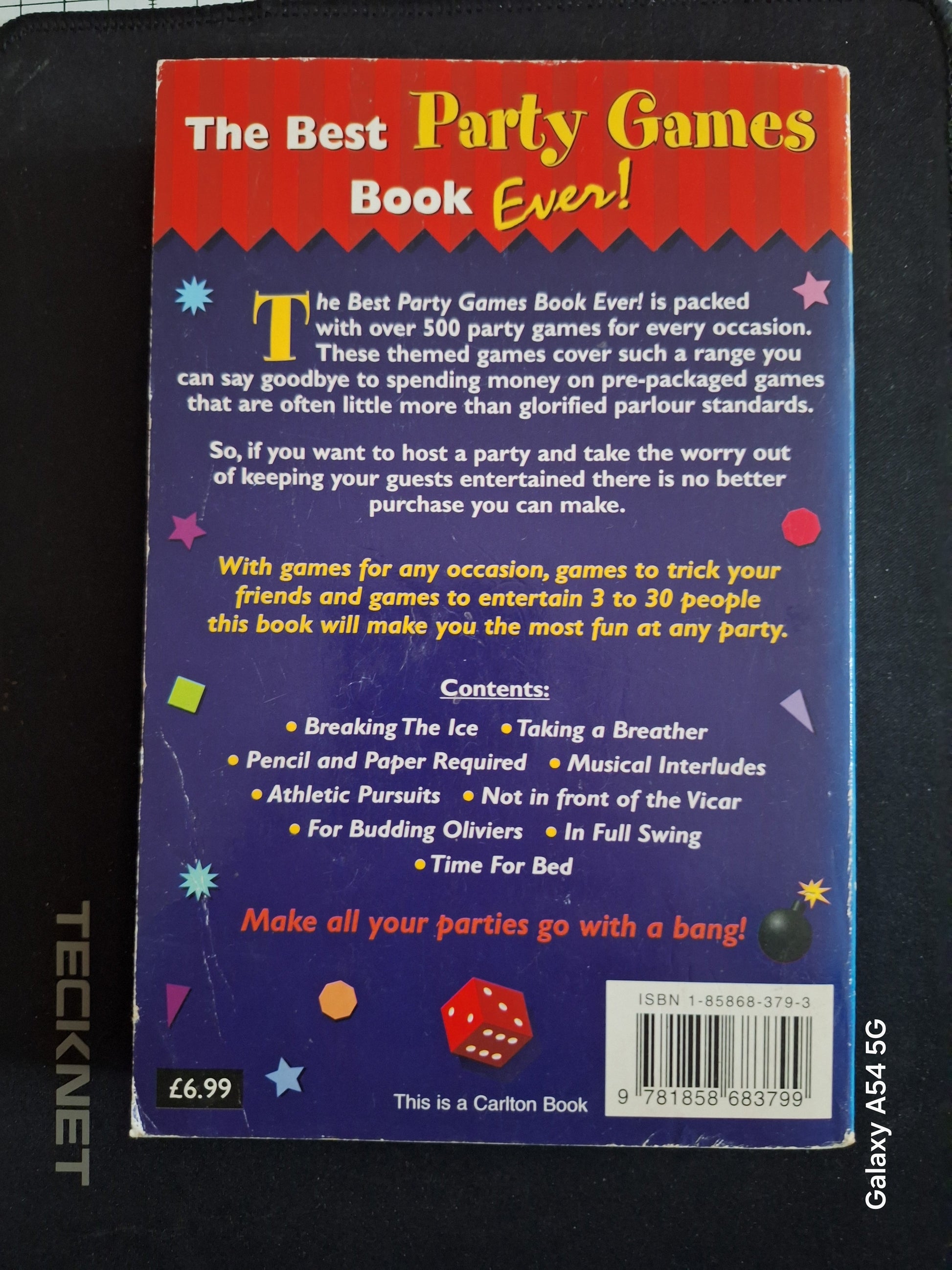 Back cover of a used party games book by Slightly Read Books featuring over 500 games for parties
