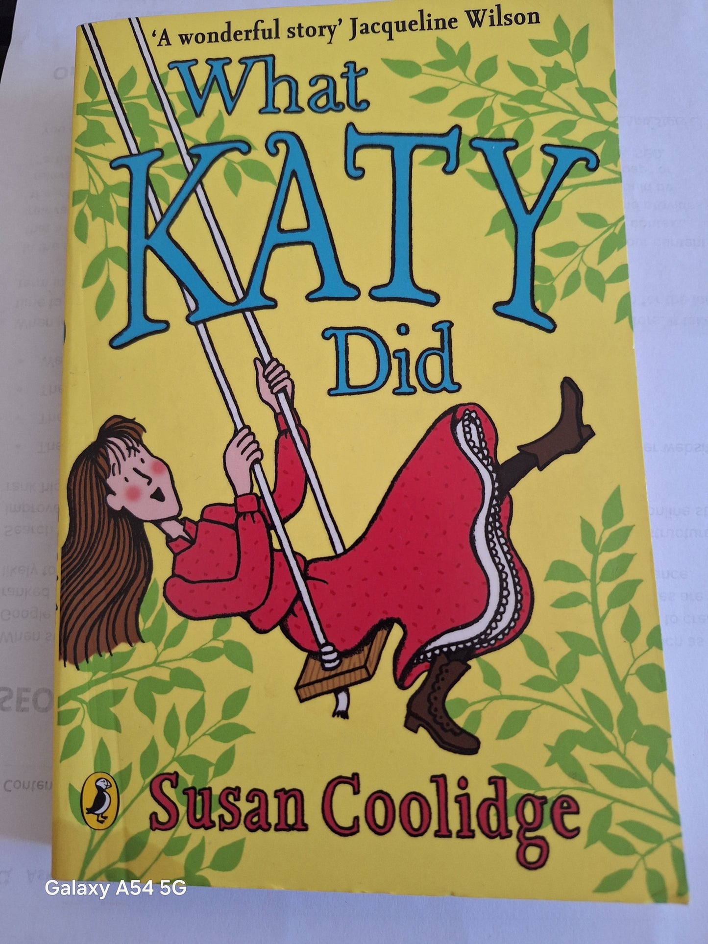 What Katy Did second hand book by Susan Coolidge featuring a girl on a swing